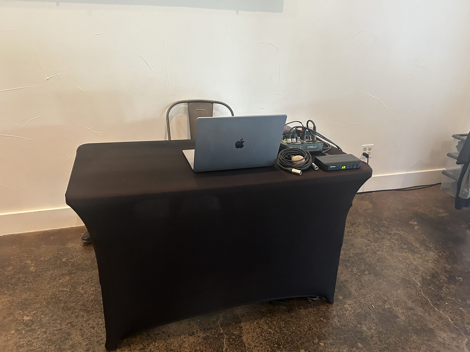 Media table set up with a laptop and mixer