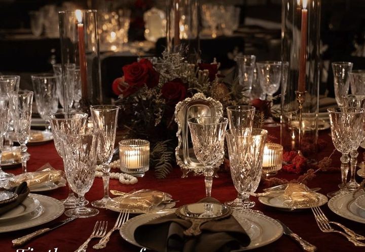 Candlelit tabletop with crystal glassware from Bright Event Rentals