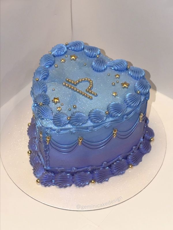 Blue and purple heart cake with vintage piping and gold stars