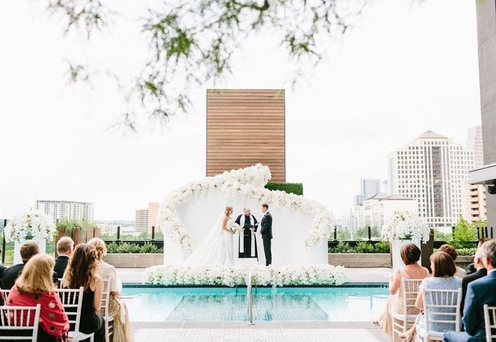 Rooftop wedding ceremony beside a pool, from Hentrich Creative Consultants