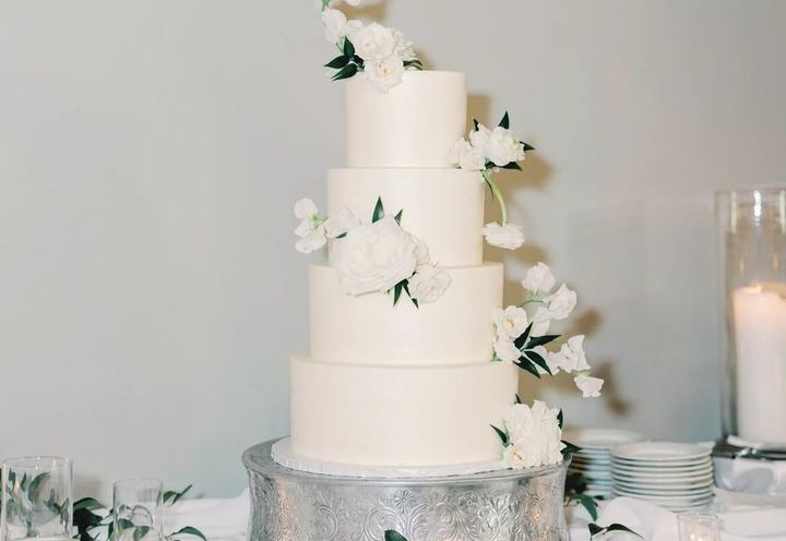 White tiered wedding cake by Sweet Treets Bakery