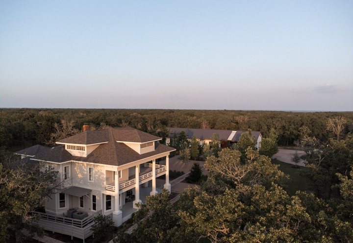 The 1881 mansion and the reception hall at The Grand Lady at sunset