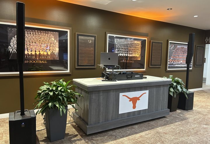 Our DJ booth with the Longhorn logo in the UT Club lobby